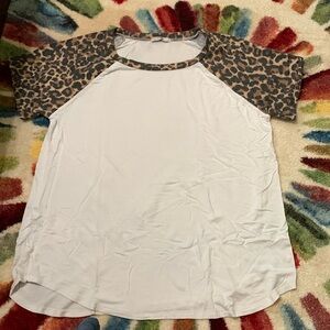 Cheetah and white blouse